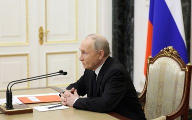 Путин